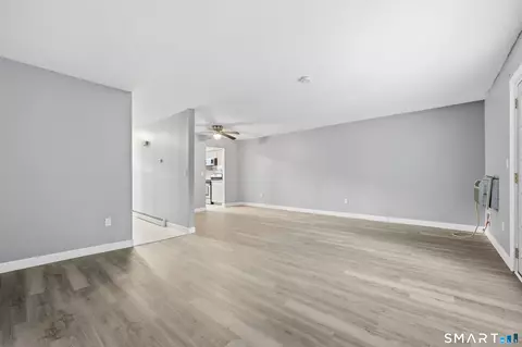 Living - 69 Sutton Pl #69, Bloomfield, CT 06002 photo 2 of 4