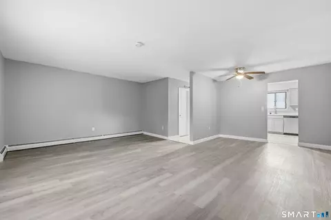 Living - 69 Sutton Pl #69, Bloomfield, CT 06002 photo 1 of 4