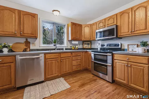 Kitchen - 301 Merrow Rd, Coventry, CT 06238 photo 1 of 2