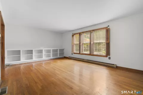 Living - 43 Robinhood Dr, Gales Ferry, CT 06335 photo 2 of 9
