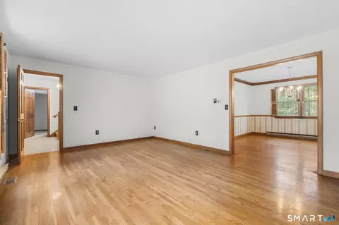 Living - 43 Robinhood Dr, Gales Ferry, CT 06335 photo 4 of 9
