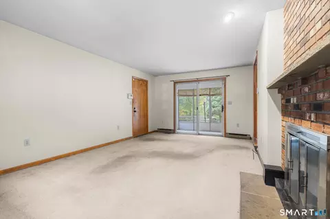 Living - 43 Robinhood Dr, Gales Ferry, CT 06335 photo 5 of 9