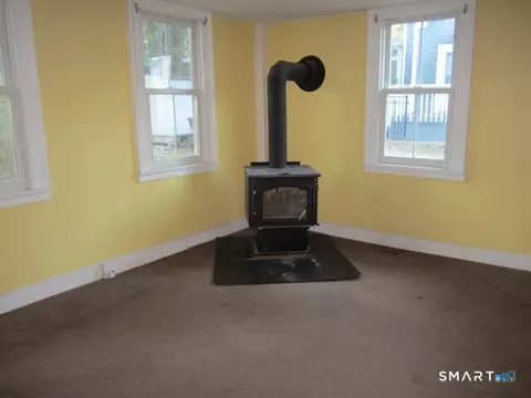 Living - 1085 Main St, Coventry, CT 06238 photo 2 of 2
