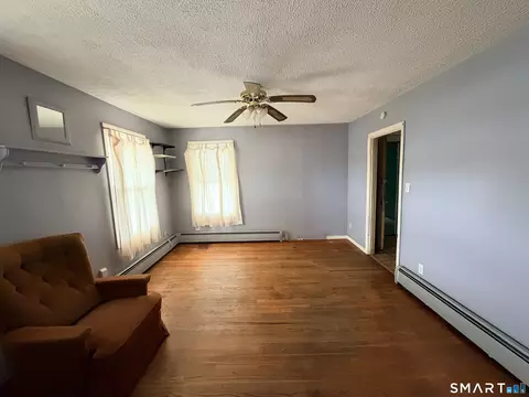 Living - 121 Elm St, Torrington, CT 06790 photo 3 of 4