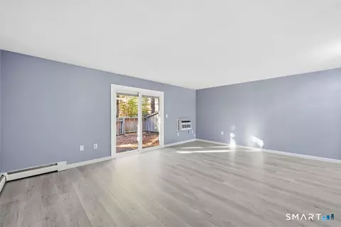 Living - 11 Sutton Pl #11, Bloomfield, CT 06002 photo 4 of 6