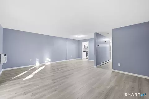 Living - 11 Sutton Pl #11, Bloomfield, CT 06002 photo 3 of 6