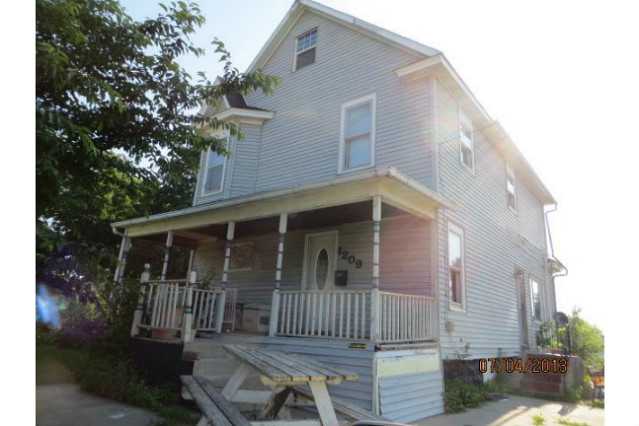 1209 10th Ave, Belle Plaine, IA 52208 photo 1