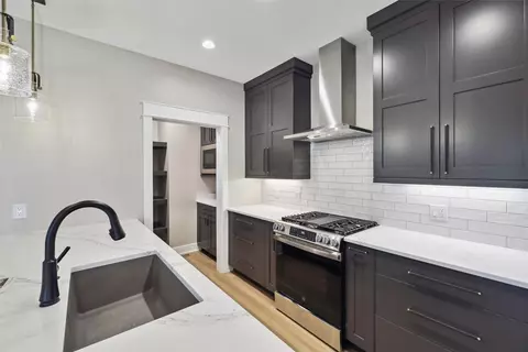 Kitchen - 831 Richland Ct, Van Meter, IA 50261 photo 3 of 3