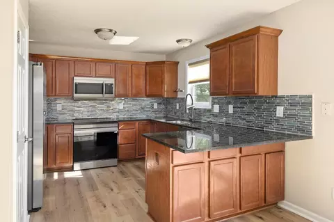 Kitchen - 105 SE Kellerman Ln, Waukee, IA 50263 photo 2 of 4