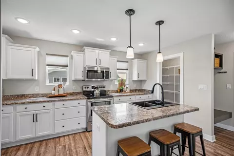 Kitchen - 1607 NE 2nd St, Stuart, IA 50250 photo 2 of 5