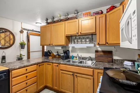 Kitchen - 102 E Walnut St, Roland, IA 50236 photo 3 of 3