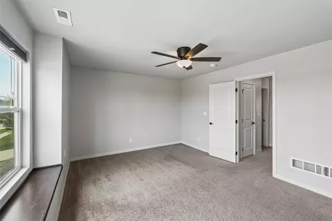 Bedroom - 423 Wildcat Ct, Stuart, IA 50250 photo 2 of 2
