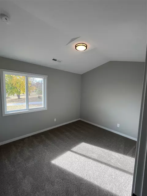 Bedroom - 611 W Wright Rd, Norwalk, IA 50211 photo 2 of 3