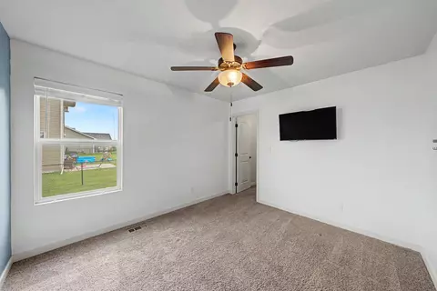 Bedroom - 1304 NE 2nd St, Stuart, IA 50250 photo 3 of 4