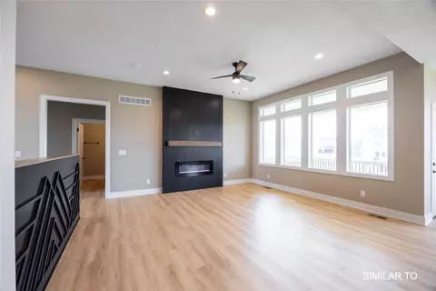 Living - 2702 Ponte Pl, Adel, IA 50003 photo 3 of 4