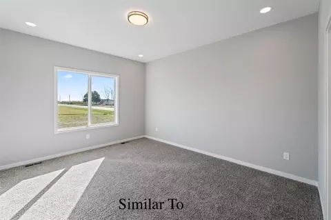 Bedroom - 1611 Stuart Ct, Stuart, IA 50250 photo 2 of 3