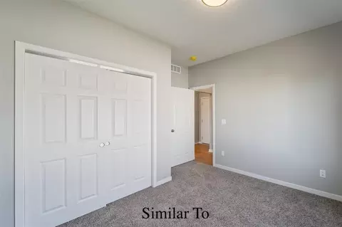 Bedroom - 1611 Stuart Ct, Stuart, IA 50250 photo 3 of 3
