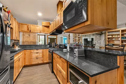 Kitchen - 4835 Lisbon St, Prole, IA 50229 photo 2 of 6