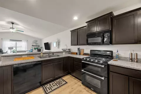 Kitchen - 7413 Summerset Ave NE, Cedar Rapids, IA 52402 photo 2 of 2
