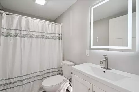 Bath - 809 Jefferson Ave, Lowden, IA 52255 photo 2 of 2