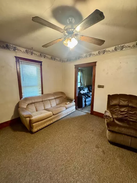 Living - 419 E 3rd St, Logan, IA 51546 photo 2 of 3