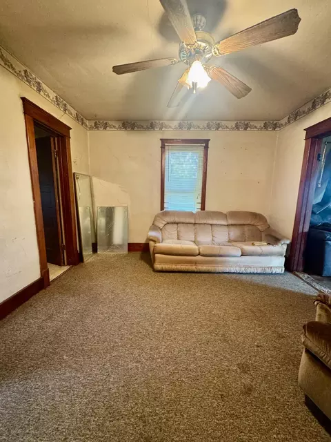Living - 419 E 3rd St, Logan, IA 51546 photo 3 of 3