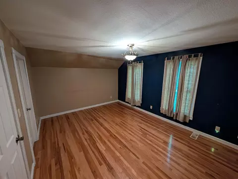 Bedroom - 113 E 5th Ave, Cresco, IA 52136 photo 1 of 3