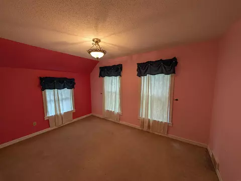 Bedroom - 113 E 5th Ave, Cresco, IA 52136 photo 2 of 3