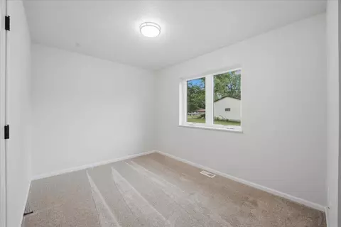 Bedroom - 206 E Miranda St, Shell Rock, IA 50670 photo 2 of 5