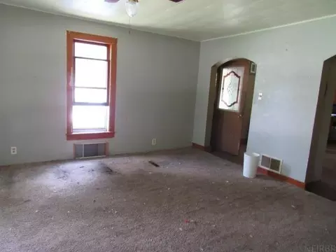 Living - 110 E Main St, Olin, IA 52320 photo 2 of 2