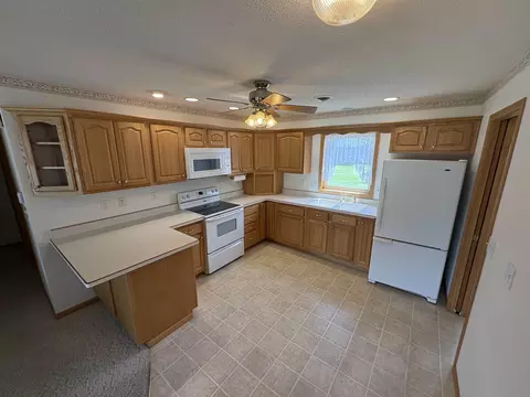 Kitchen - 205 E Ridge St, Readlyn, IA 50668 photo 2 of 3