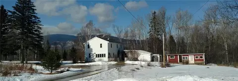 1409 Rangeley Rd, Lang Twp, ME 04970 photo 1