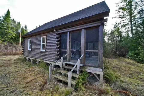 Exterior - 60 Lower Lake Rd, Danforth, ME 04424 photo 3 of 16
