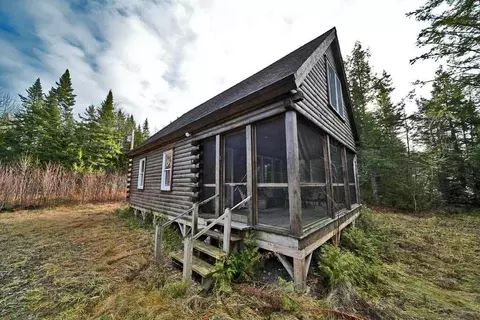 Exterior - 60 Lower Lake Rd, Danforth, ME 04424 photo 13 of 16