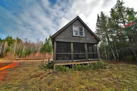 Exterior - 60 Lower Lake Rd, Danforth, ME 04424 photo 14 of 16