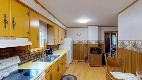 Kitchen - 180 Bowdoin St, Millinocket, ME 04462 photo 3 of 4