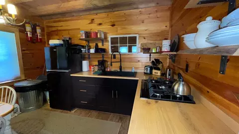 Kitchen - 1261 Dirigo Rd, Enchanted Twp, ME 04945 photo 1 of 2