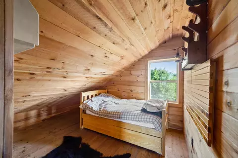 Bedroom - 1261 Dirigo Rd, Enchanted Twp, ME 04945 photo 2 of 3