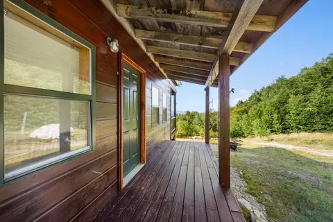 Exterior - 1261 Dirigo Rd, Enchanted Twp, ME 04945 photo 3 of 5