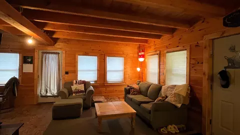 Living - 1261 Dirigo Rd, Enchanted Twp, ME 04945 photo 1 of 2