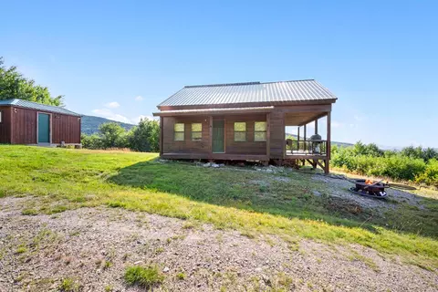 Exterior - 1261 Dirigo Rd, Enchanted Twp, ME 04945 photo 4 of 5