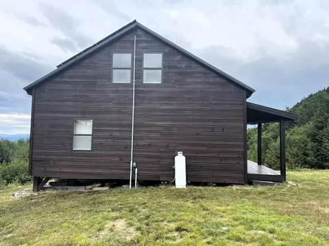 Exterior - 1261 Dirigo Rd, Enchanted Twp, ME 04945 photo 5 of 9