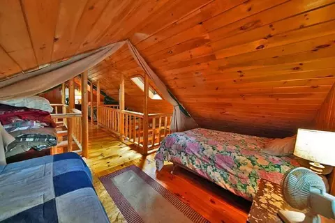 Bedroom - 638 Sandy Beach Rd, Danforth, ME 04424 photo 9 of 10