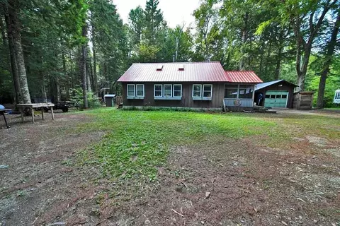 Exterior - 638 Sandy Beach Rd, Danforth, ME 04424 photo 6 of 25