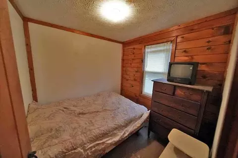 Bedroom - 461 Sandy Beach Rd, Danforth, ME 04424 photo 1 of 3