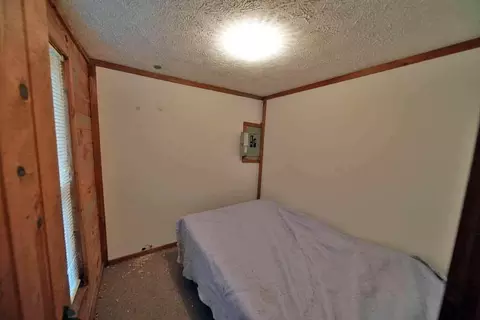 Bedroom - 461 Sandy Beach Rd, Danforth, ME 04424 photo 3 of 3