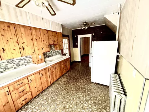 Kitchen - 34 Lincoln St, Millinocket, ME 04462 photo 2 of 3