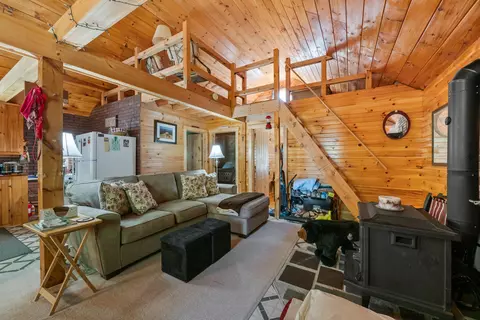 Living - 5 Pine Ln, Dallas Plt, ME 04970 photo 1 of 4