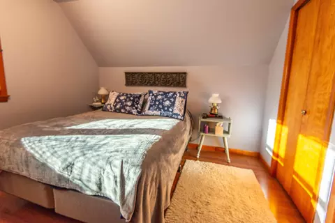 Bedroom - 310 Katahdin Ave, Millinocket, ME 04462 photo 2 of 3