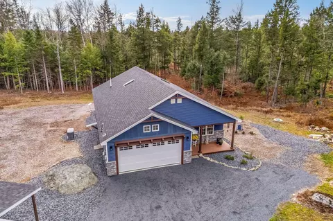 Exterior - 52 E Shore Rd, Embden, ME 04958 photo 3 of 13